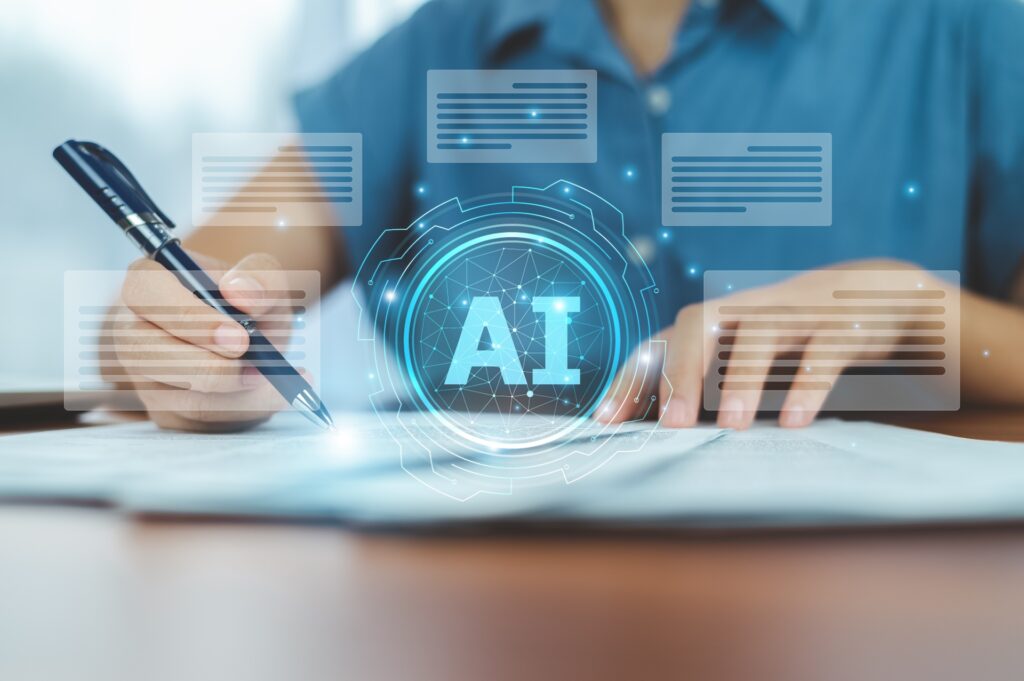 Person reviewing claim documents with AI automation graphics symbolizing digital claims analysis.